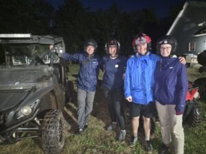 Guests preparing for a guided ATV tour in New Brunswick at Mud to Moose Trail Adventures